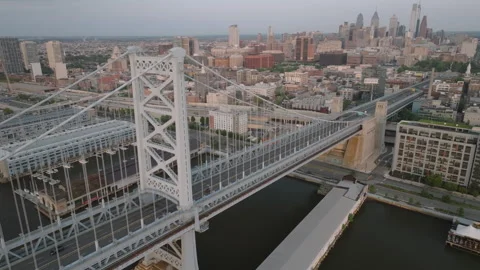 Aerial view of the Ben Franklin Bridge at sunrise Stock Footage 314146772