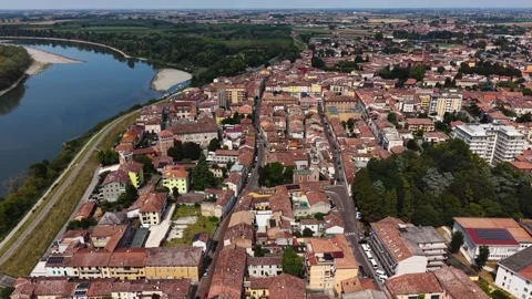 Aerial view beside the old town and above the city Casalmaggiore in Italy Vídeo Stock 343801030