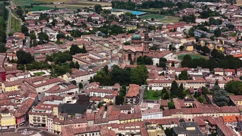 Aerial view beside the old town and above the city Casalmaggiore in Italy Vídeo Stock 343801098