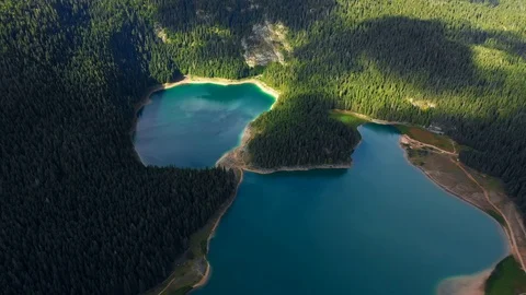 Aerial view a bewitching view of a mountain lake with forest Stock Footage 117586351