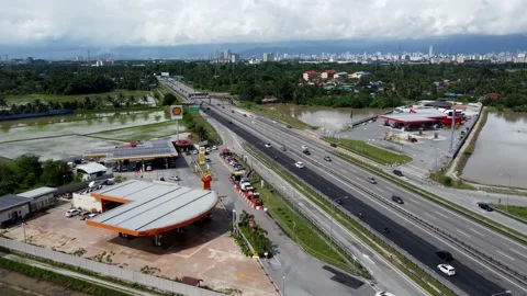 Aerial view BHP, Shell, Caltex petrol station Stock Footage 168341381