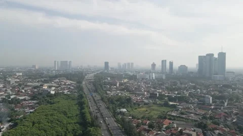 Aerial view of a big city with a cloudy sky Stock Footage 259787853