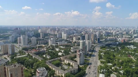 Aerial view of big city with modern high-rise buildings with car traffic Stock Footage 134861237
