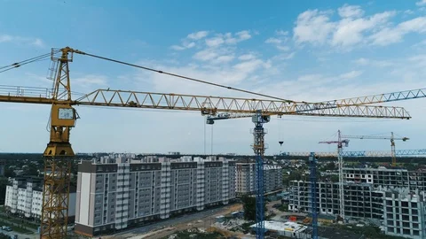 Aerial view big construction crane on a building background, close up. Stock Footage 112433533