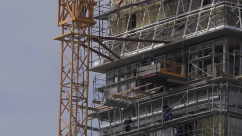Aerial view big construction crane, close up construction site. Stock Footage 161472541