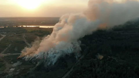 Aerial view at big fire at garbage dump, burning pollutes the environment Video stock 144752707