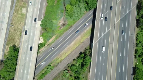 Aerial view of a big highway with normal traffic on it Stock Footage 132375035