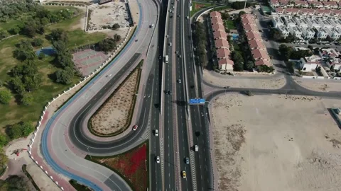 Aerial view on a big intersection with lots of traffic in the middle of Dubai 4k Stockbeeldmateriaal 151931618