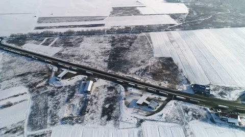 Aerial view: Big queue of trucks. Truck sump. Long queues at the customs. HD Видео 104618369