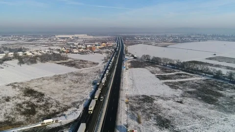 Aerial view: Big queue of trucks. Truck sump. Long queues at the customs. HD Видео 104618648