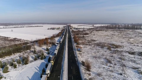 Aerial view: Big queue of trucks. Truck sump. Long queues at the customs. HD Vídeos de archivo 104618830