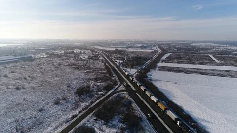 Aerial view: Big queue of trucks. Truck sump. Long queues at the customs. HD Видео 104619129