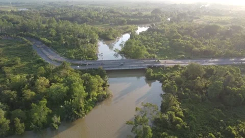 Aerial view of the big river in the evening with brown river water Stock Footage 247941094