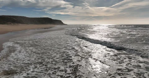 Aerial view of big sandy beach on a Portugal coast of Atlantic ocean. Drone Stock Footage 221139657