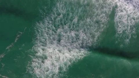 Aerial view of big waves coming along the coast. Stock Footage