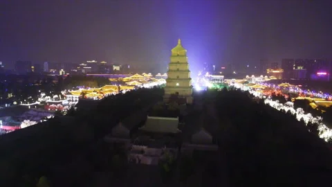 AERIAL View of Big Wild Goose Pagoda scenic spot and city skyline at night ,Xi Stock Footage 123715791