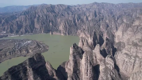 Aerial View of Bingling Temple Grottoes on Yellow River Cliff Linxia Gansu China Vídeos de archivo 336376653