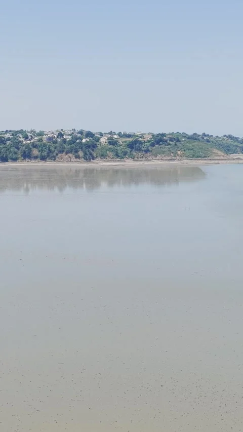 Aerial view of Binic beach and town on a clear summer day in Brittany, France Stock Footage 346663449