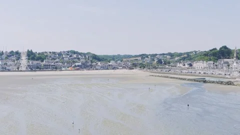 Aerial view of Binic beach and town on a clear summer day in Brittany, France Stock Footage 346664628