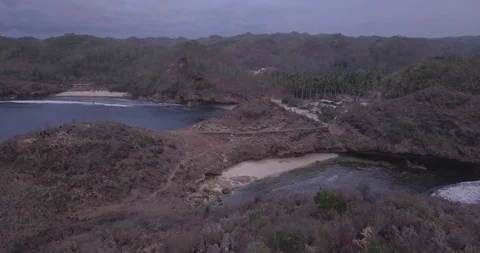 Aerial view, bird view, from the hills and the beautiful white sand beach whe Stock Footage 121647481