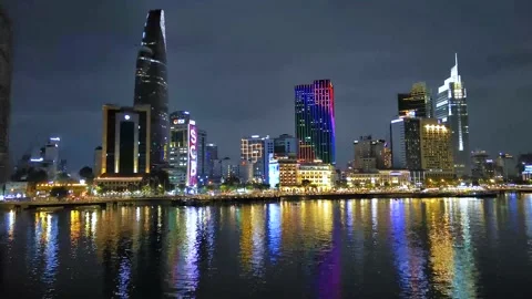 Aerial view of Bitexco Tower, buildings, roads, Thu Thiem 2 bridge and Saigon Stock Footage 201922112