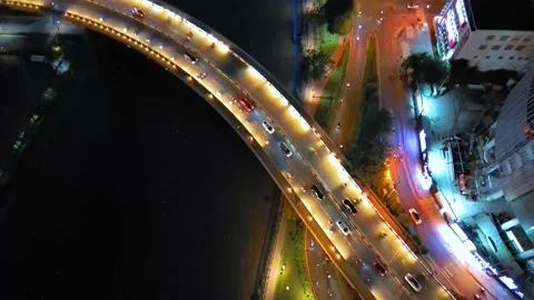 Aerial view of Bitexco Tower, buildings, roads, Thu Thiem 2 bridge and Saigon Stock Footage 201922973
