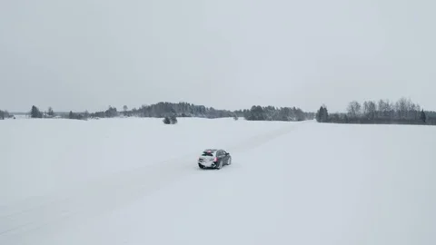 The aerial view of the black car running on the road Stock Footage 101720650