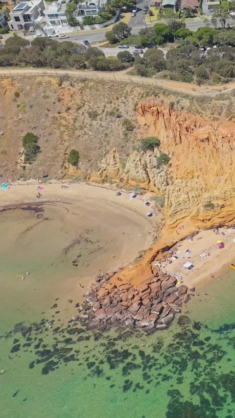 Aerial View of The Black Pin at Half Moon Bay with Cliffs and Beach Stock Footage 327911038