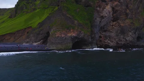 Aerial view of black sand beach and basalt cave near Vik, Iceland Stock Footage 340834925