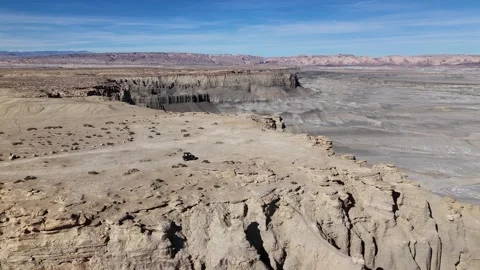 Aerial View of Black UTV Vehicle on Moonscape Overlook Viewpoint of Desert Stock Footage 320103792