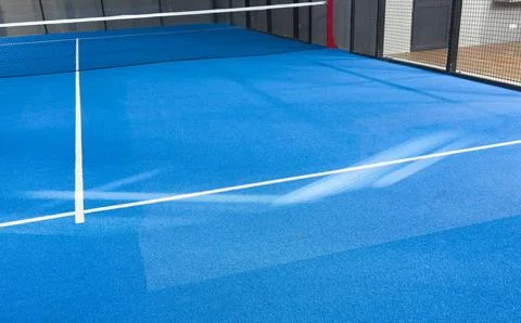 Aerial view of a blue artificial grass paddle tennis court Stock Photos