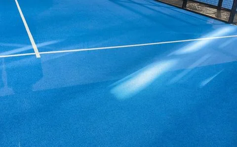 Aerial view of a blue artificial grass paddle tennis court Stock Photos