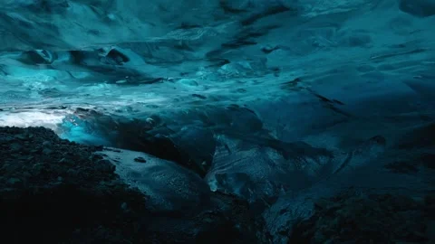 Aerial view of blue ice formations in a glacier cave, Iceland. Stock Footage 345668759