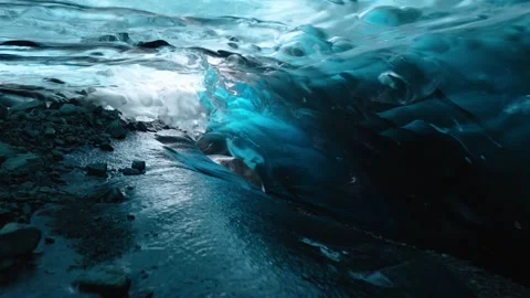 Aerial view of blue ice formations in a glacier cave, Iceland. Stock Footage 345668810