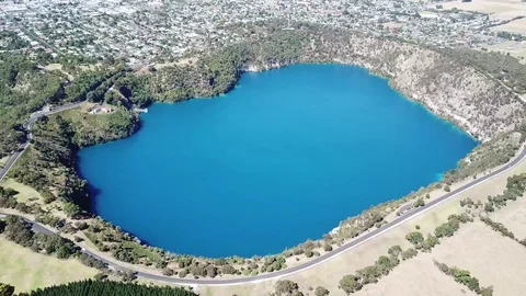 Aerial view of Blue Lake in Mount Gambier, South Australia (Dolly out) Stock Footage