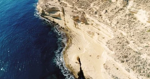 Aerial view of blue Mediterranean Sea and cliffs Stock Footage