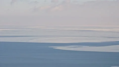 Aerial View of Blue Ocean with Floating Ice Stock-Footage 326414968