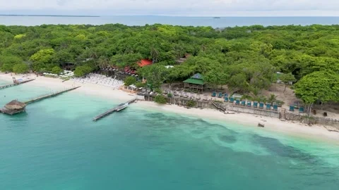 Aerial view of blue ocean waves near tropical resort in Cartagena Stock Footage 330738384