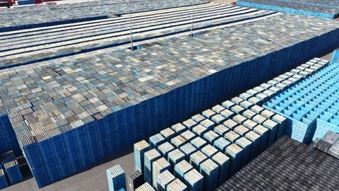 Aerial view of blue plastic recycling crates stored outdoors Video stock 339304539