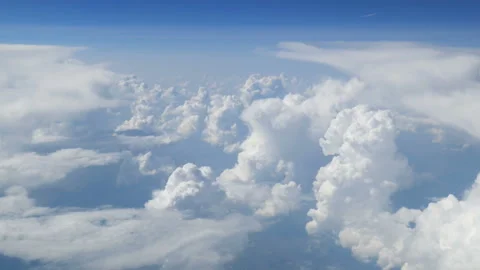 Aerial view of blue sky with clouds, blue sky high view from airplane clouds Stock Footage 151348085