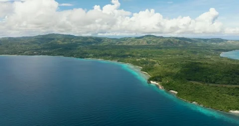 Aerial view of Blue sky with clouds over sea in Tropical Island. Stock Footage 245274639
