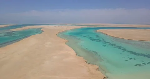Aerial view: blue sky, sandy island in Red Sea, Egypt Stock Footage 150795253