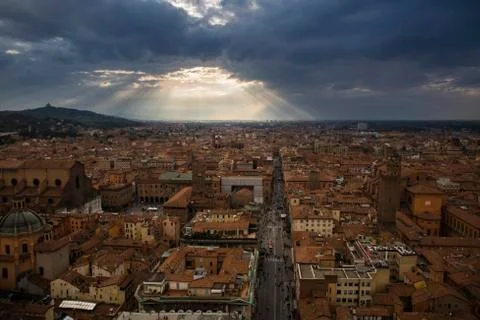 Aerial view on a blue sunset with cloudy sky background over Bologna Stock Photos