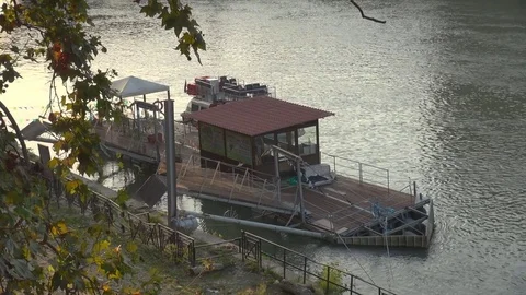 Aerial view boarding station on River Tiber ship sailing in Rome downtown city Video stock 84728876