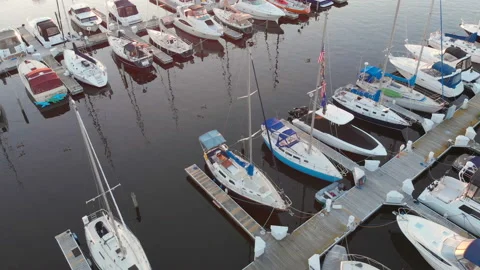 Aerial view of boat dock, Drone flying over water and sailing yachts. 库存影片 112321999