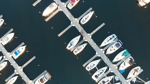 Aerial view of boat dock, Drone flying over water and sailing yachts. Vidéo 112359392