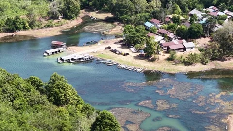 An aerial view of the boat dock at Riam Kanan Reservoir in Banjarbaru, with.. Stock Footage 346592965