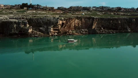 Aerial view of a boat moving forward on a river. Stock Footage 236909266