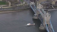 Aerial View Of A Boat Passing Underneath London's Tower Bridge Stock Footage