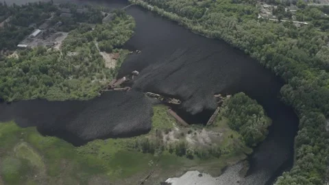 Aerial view of boat, ship and barge graveyard on the Pripyat Stock Footage 157154162